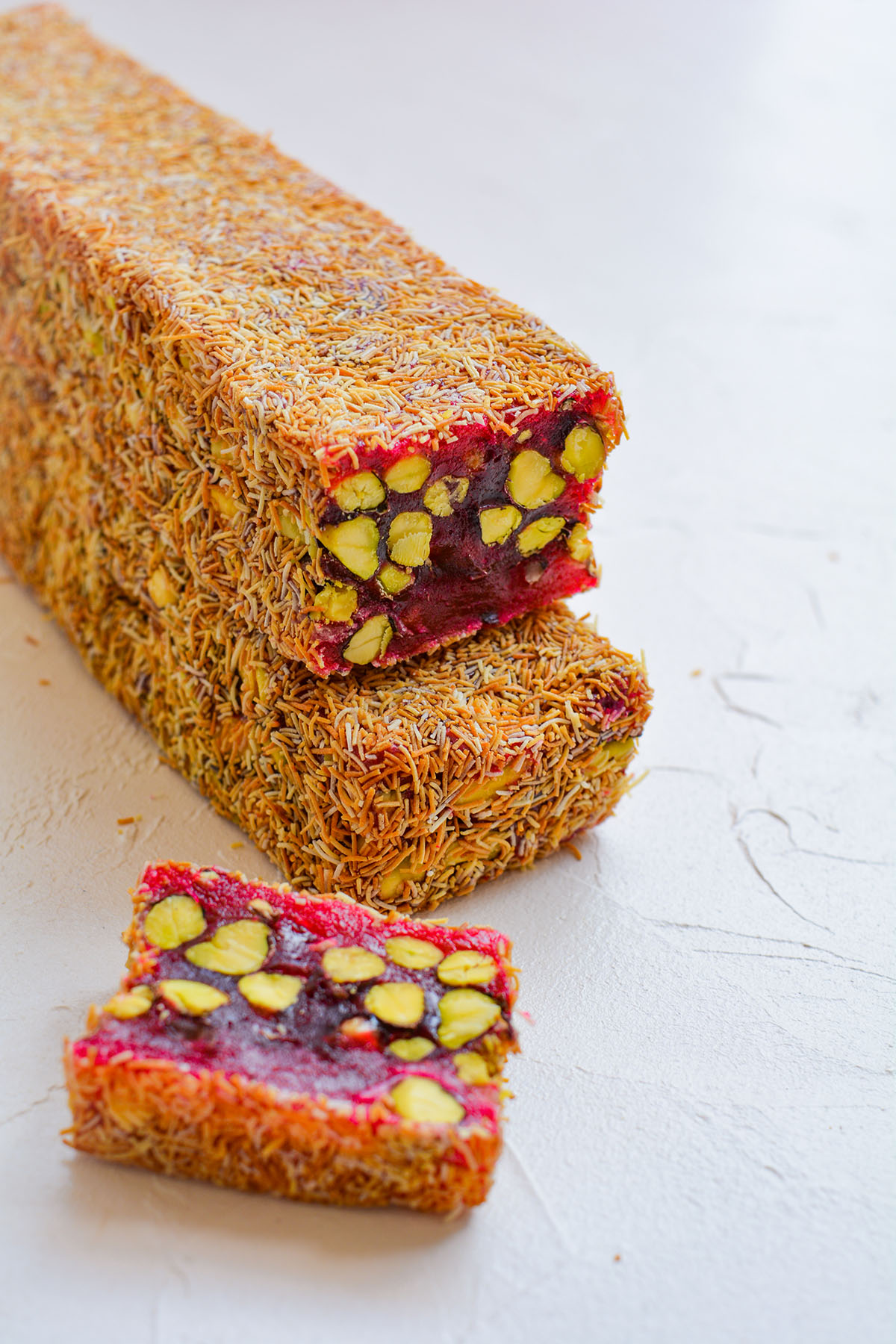 Lomio Delight With Kadaif, Pomegranate And Pistachio